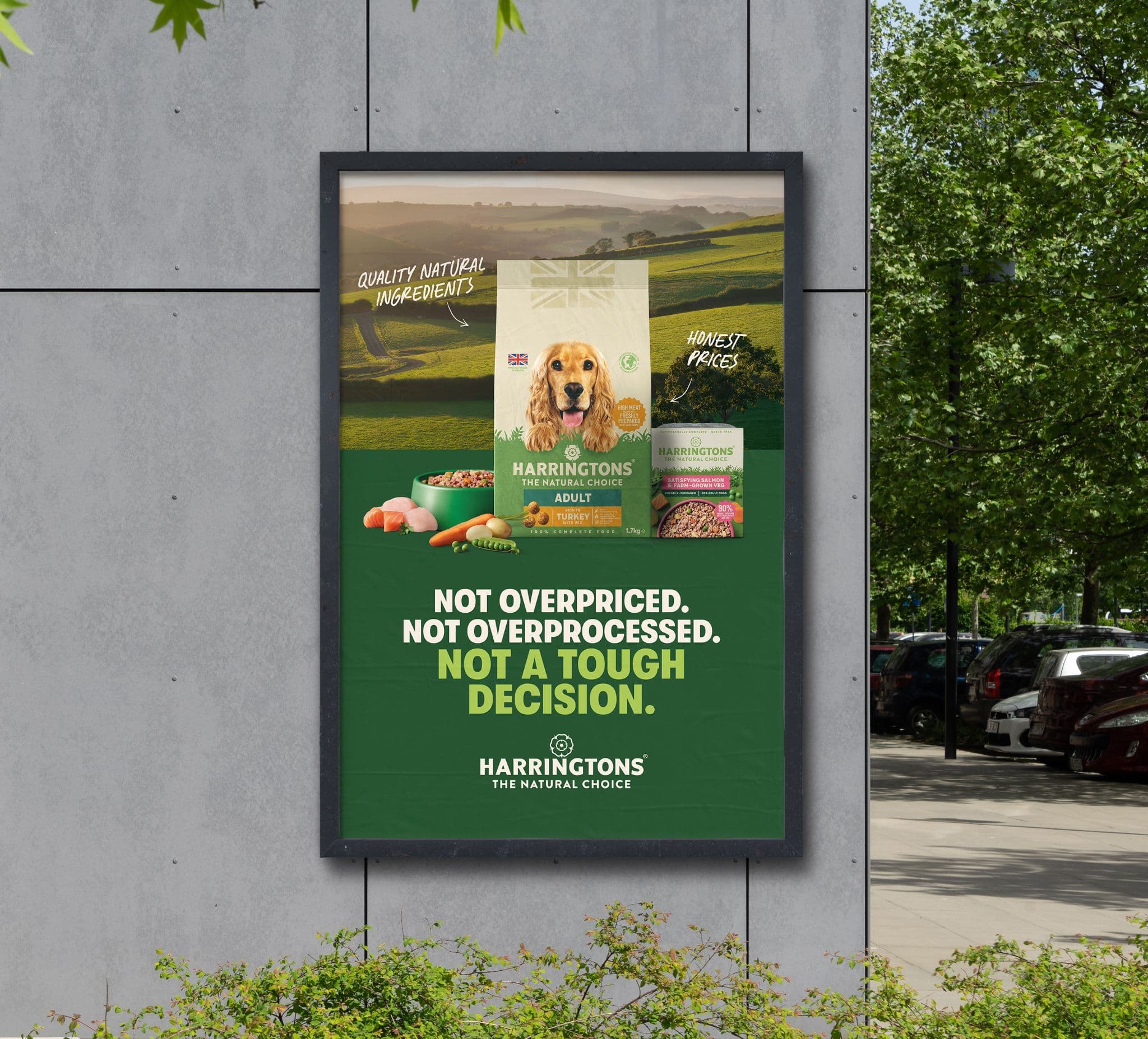 Outdoor billboard featuring a Harringtons dog food ad with the text "Not overpriced. Not overprocessed. Not a tough decision."