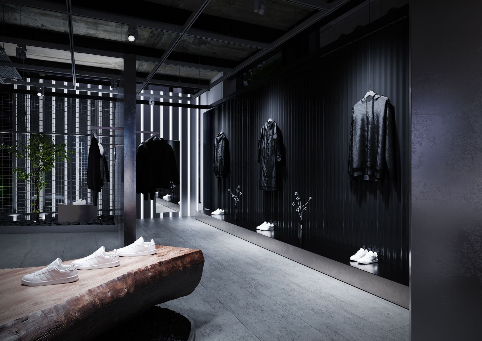 Minimalist Y-3 retail store interior featuring black apparel on ribbed walls and white sneakers on a wooden bench.